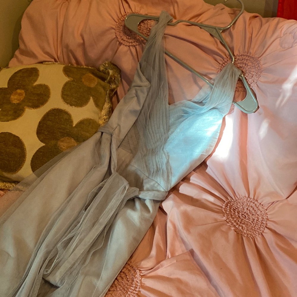Wtoo dress in sage green and long.